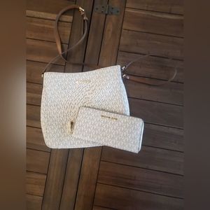 Michael kors cream color cross body bag and matching wallet